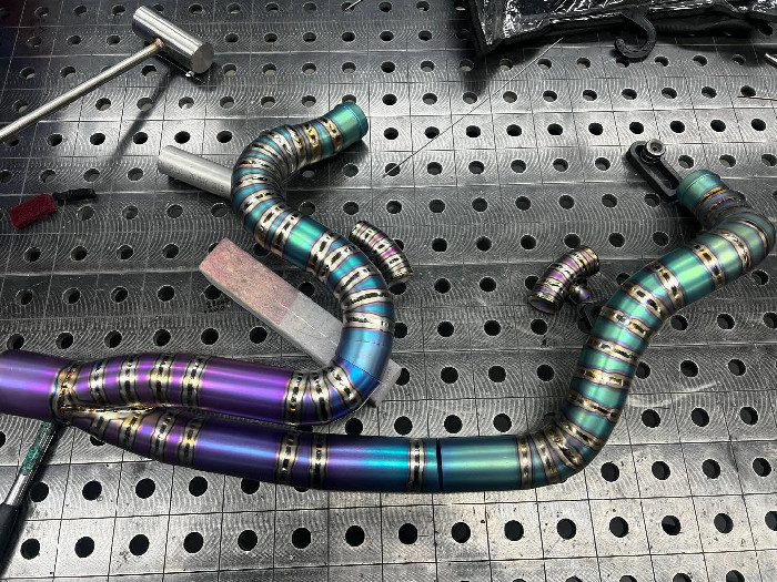 Segmented titanium exhaust on Harley TITAN