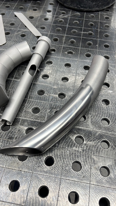 Building the exhaust segment by segment